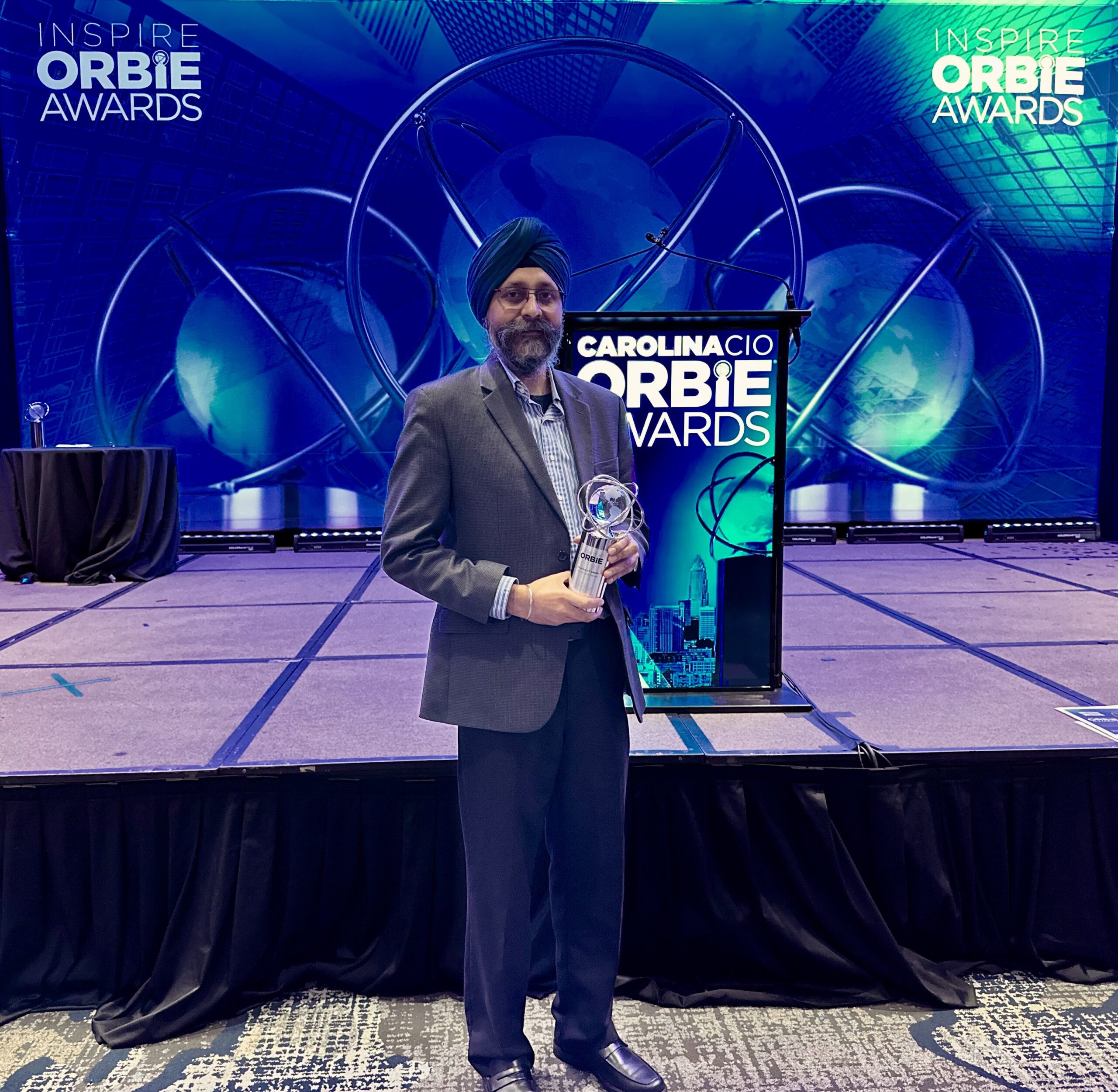 CIO Pawanjit Singh being awarded an orbie award